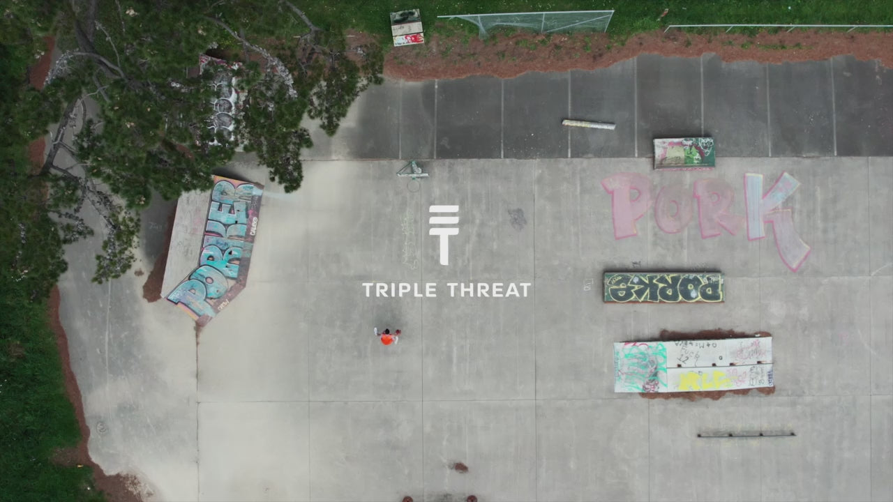 Load video: Man performing basketball dunk in Triple Threat Clothing