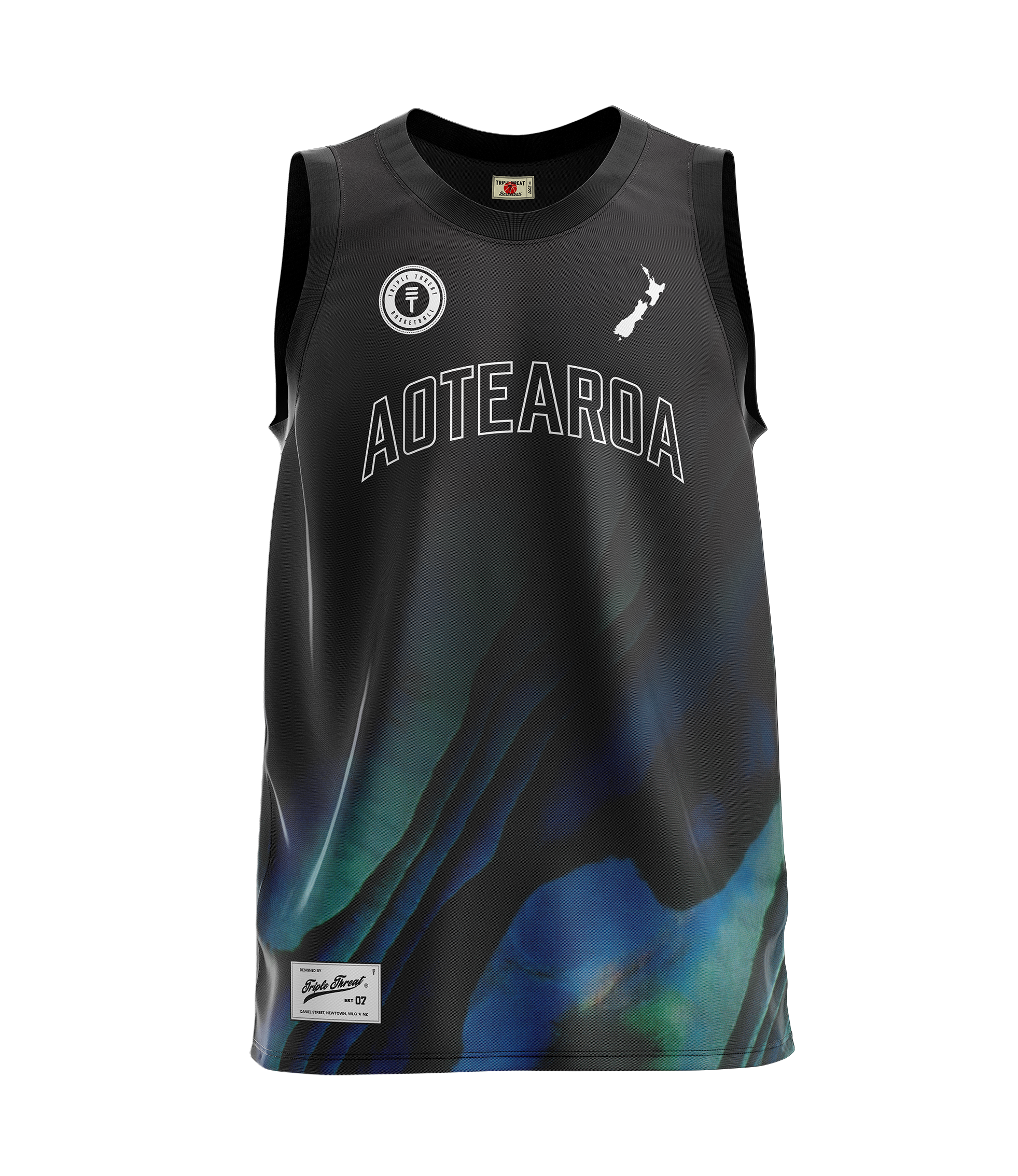 children's black basketball singlet with a paua design at the bottom  featuring "Aoteatora" as text, the New Zealand map and Triple Threat logo