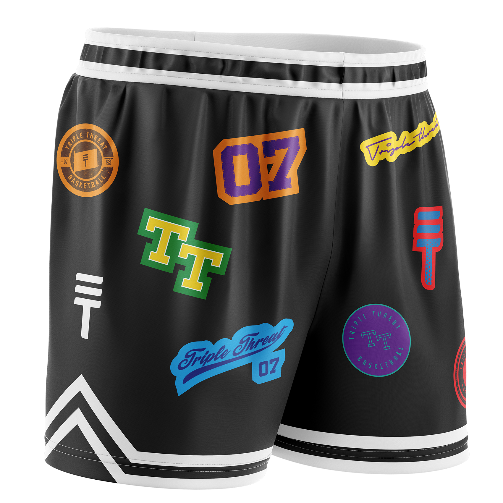 Kids black basketball shorts with colourful logos, white accents, elastic waistband, and the Triple Threat logo