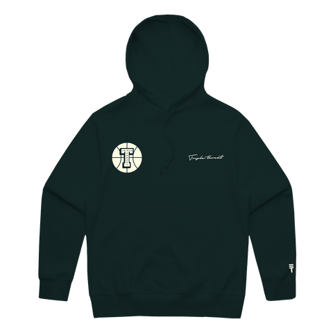 Dark green hoodie with 'Triple Threat' embroidered in white and a white basketball Triple Threat branding logo and small white logo on the bottom left sleeve