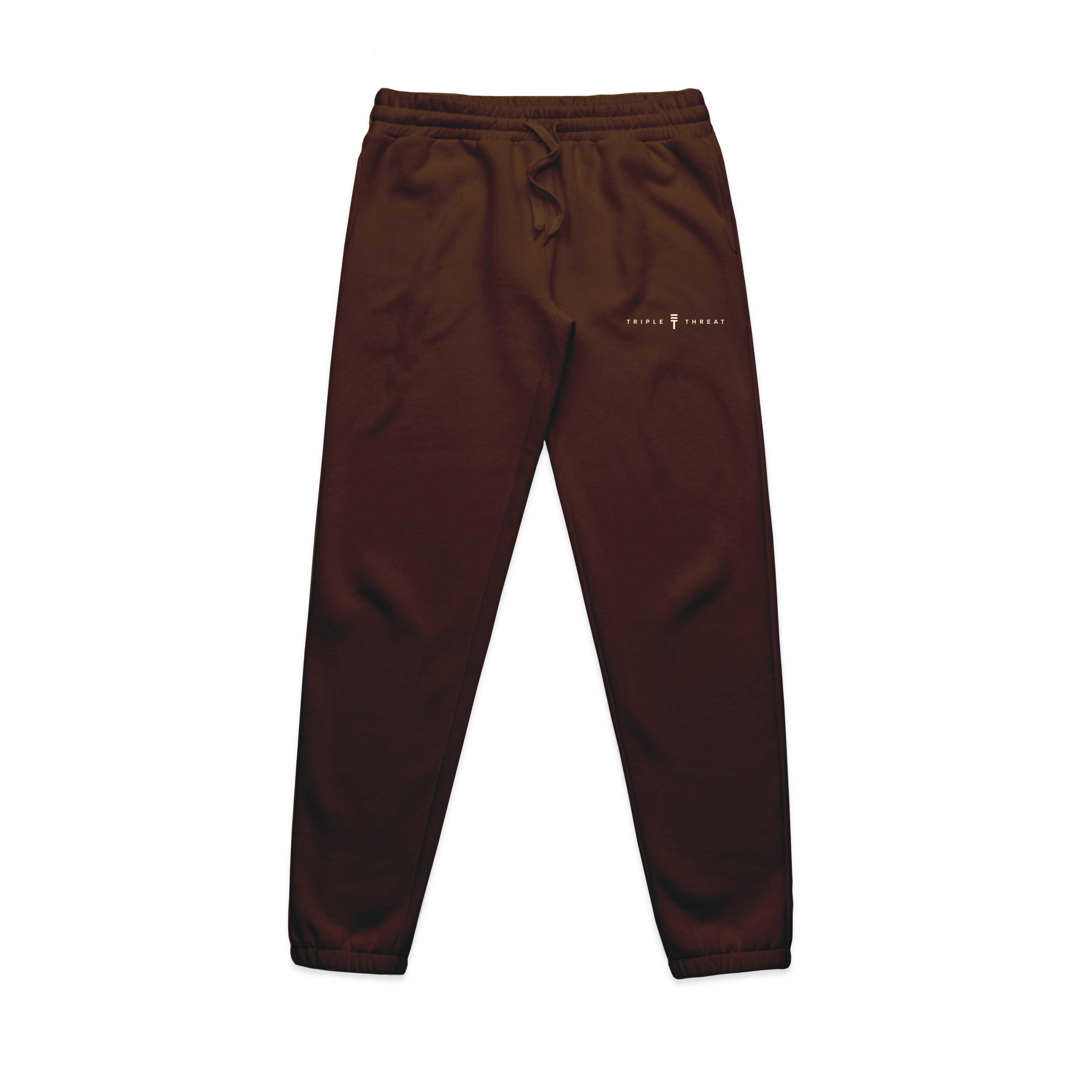 Brown Triple Threat track pants in brown with the Triple Threat name and logo in white and elasticated waist and cuffs
