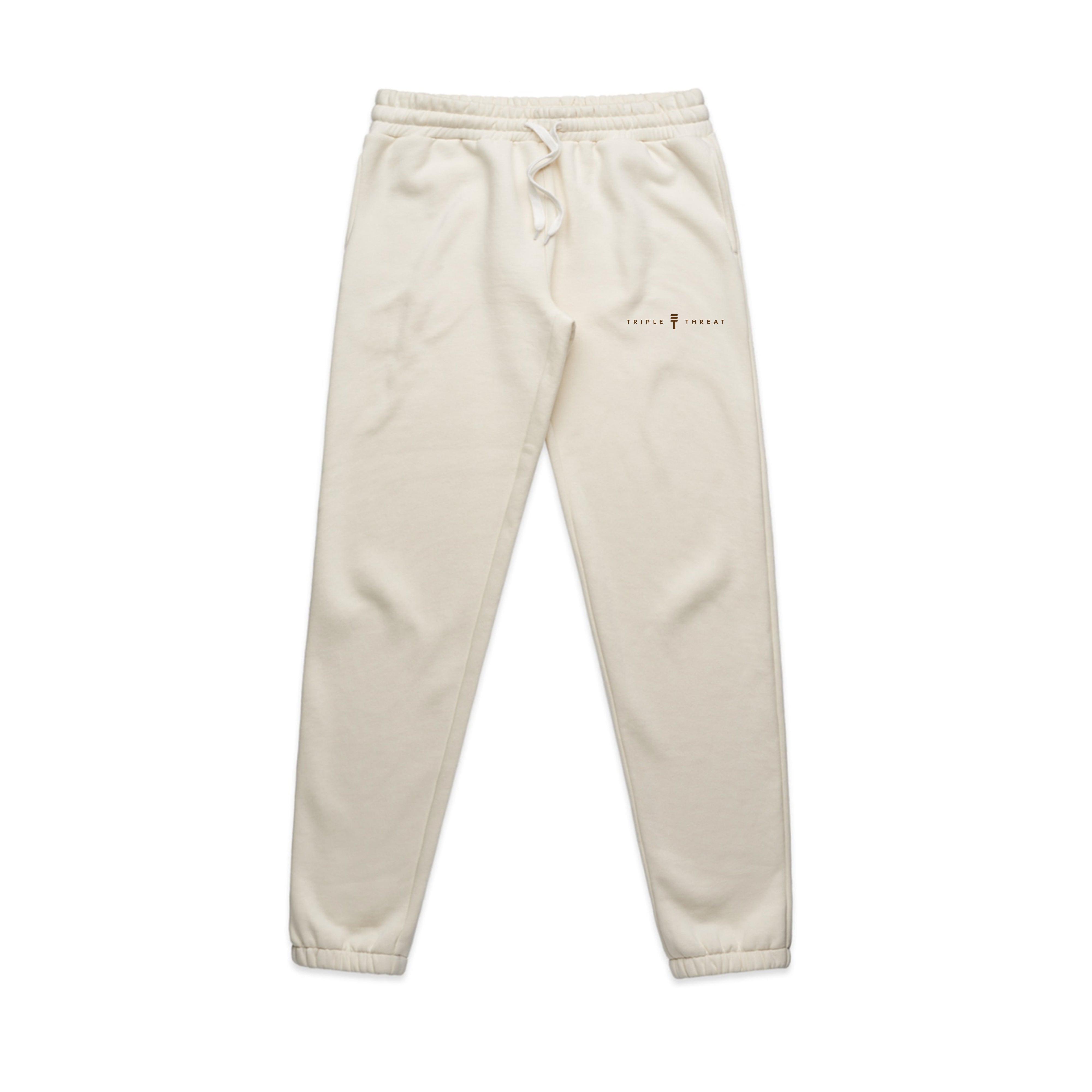 Cream track pants from Triple Threat with logo and name in brown and elastic waist and cuffs