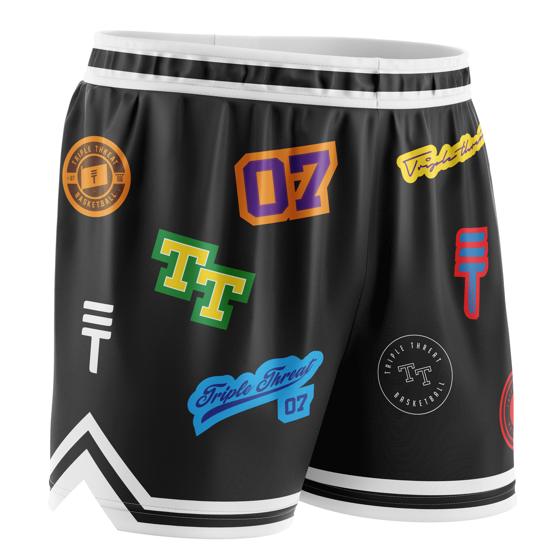 Kids black basketball shorts with colourful logos, white accents, elastic waistband, and the Triple Threat logo.