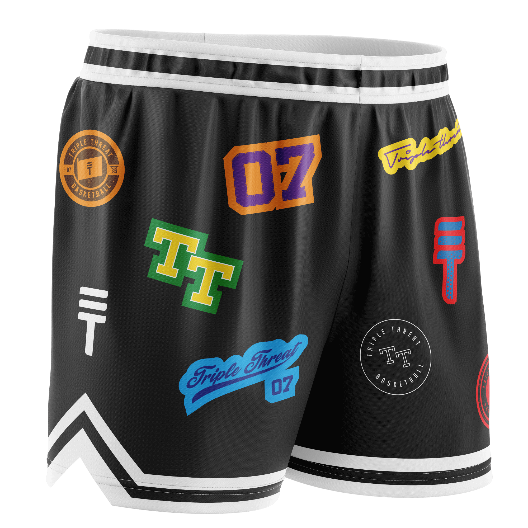 Kids black basketball shorts with colourful logos, white accents, elastic waistband, and the Triple Threat logo.