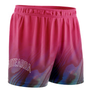 kids pink basketball shorts with Paua design at bottom with "Aotearoa' in white text