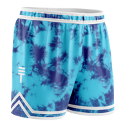 Blue and navy tie-dye basketball shorts with white trim, elastic waistband, and the Triple Threat logo near the hem